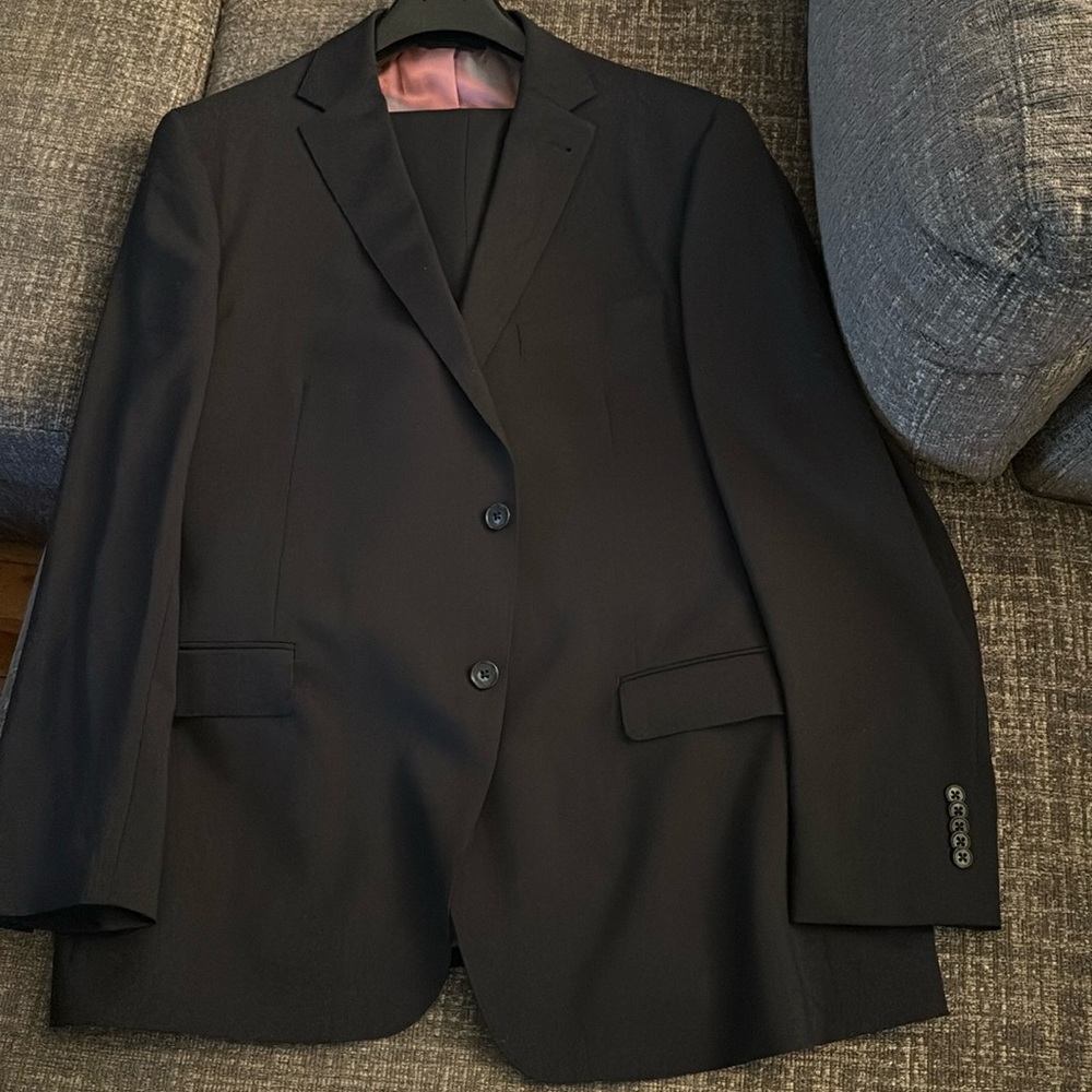 Dark blue suit worn once